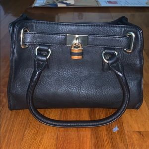 Black small handle charming Charlie purse